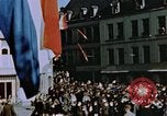 Image of civilians in street square Luxembourg, 1945, second 31 stock footage video 65675056170