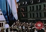 Image of civilians in street square Luxembourg, 1945, second 32 stock footage video 65675056170