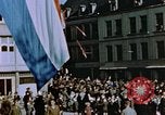 Image of civilians in street square Luxembourg, 1945, second 36 stock footage video 65675056170