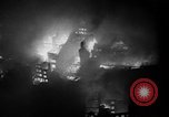 Image of burning buildings during London blitz London England United Kingdom, 1941, second 17 stock footage video 65675056185