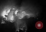 Image of burning buildings during London blitz London England United Kingdom, 1941, second 18 stock footage video 65675056185