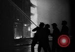 Image of burning buildings during London blitz London England United Kingdom, 1941, second 32 stock footage video 65675056185