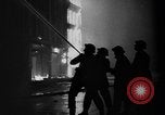 Image of burning buildings during London blitz London England United Kingdom, 1941, second 33 stock footage video 65675056185