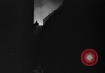 Image of burning buildings during London blitz London England United Kingdom, 1941, second 34 stock footage video 65675056185