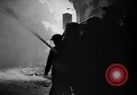 Image of burning buildings during London blitz London England United Kingdom, 1941, second 43 stock footage video 65675056185