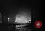 Image of burning buildings during London blitz London England United Kingdom, 1941, second 45 stock footage video 65675056185