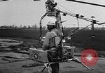 Image démonstration de moulinet hélicoptère portable California United States USA, 1957, de la seconde 7 séquences d'archives historiques vidéo 65675056224