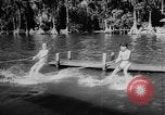 Image of water ski show Florida United States USA, 1957, second 6 stock footage video 65675056228