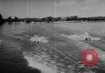 Image of water ski show Florida United States USA, 1957, second 16 stock footage video 65675056228