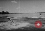 Image of water ski show Florida United States USA, 1957, second 23 stock footage video 65675056228