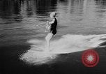 Image of water ski show Florida United States USA, 1957, second 47 stock footage video 65675056228
