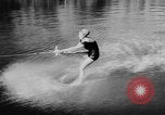 Image of water ski show Florida United States USA, 1957, second 51 stock footage video 65675056228