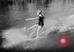 Image of water ski show Florida United States USA, 1957, second 52 stock footage video 65675056228