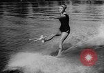 Image of water ski show Florida United States USA, 1957, second 57 stock footage video 65675056228