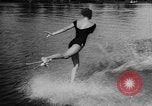 Image of water ski show Florida United States USA, 1957, second 59 stock footage video 65675056228