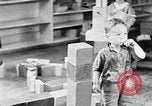Image of children at nursery school United States USA, 1935, second 13 stock footage video 65675056245