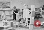 Image of children at nursery school United States USA, 1935, second 25 stock footage video 65675056245