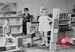 Image of children at nursery school United States USA, 1935, second 26 stock footage video 65675056245