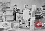 Image of children at nursery school United States USA, 1935, second 27 stock footage video 65675056245