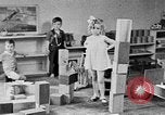 Image of children at nursery school United States USA, 1935, second 28 stock footage video 65675056245