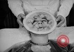 Image of vegetable facial beauty treatment New York United States USA, 1938, second 14 stock footage video 65675056262