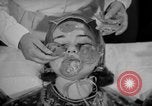 Image of vegetable facial beauty treatment New York United States USA, 1938, second 26 stock footage video 65675056262