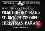 Image of Christmas parade Hollywood Los Angeles California USA, 1940, second 1 stock footage video 65675056286