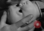 Image of little sister dolls Long Island New York USA, 1940, second 18 stock footage video 65675056287