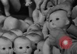 Image of little sister dolls Long Island New York USA, 1940, second 32 stock footage video 65675056287
