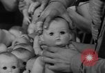 Image of little sister dolls Long Island New York USA, 1940, second 34 stock footage video 65675056287