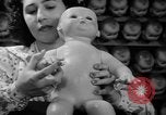 Image of little sister dolls Long Island New York USA, 1940, second 36 stock footage video 65675056287