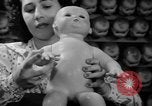 Image of little sister dolls Long Island New York USA, 1940, second 37 stock footage video 65675056287
