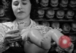 Image of little sister dolls Long Island New York USA, 1940, second 39 stock footage video 65675056287