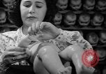 Image of little sister dolls Long Island New York USA, 1940, second 40 stock footage video 65675056287