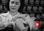 Image of little sister dolls Long Island New York USA, 1940, second 43 stock footage video 65675056287