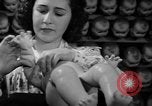 Image of little sister dolls Long Island New York USA, 1940, second 44 stock footage video 65675056287