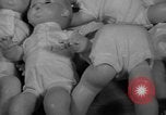 Image of little sister dolls Long Island New York USA, 1940, second 48 stock footage video 65675056287