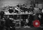 Image of police and firemen mend toys New York United States USA, 1940, second 7 stock footage video 65675056288