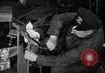 Image of police and firemen mend toys New York United States USA, 1940, second 8 stock footage video 65675056288