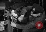 Image of police and firemen mend toys New York United States USA, 1940, second 9 stock footage video 65675056288