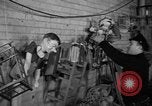 Image of police and firemen mend toys New York United States USA, 1940, second 10 stock footage video 65675056288
