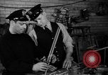 Image of police and firemen mend toys New York United States USA, 1940, second 15 stock footage video 65675056288