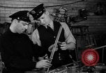 Image of police and firemen mend toys New York United States USA, 1940, second 16 stock footage video 65675056288