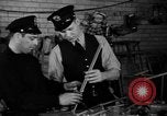 Image of police and firemen mend toys New York United States USA, 1940, second 17 stock footage video 65675056288