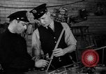 Image of police and firemen mend toys New York United States USA, 1940, second 18 stock footage video 65675056288