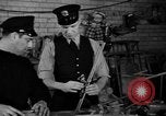 Image of police and firemen mend toys New York United States USA, 1940, second 24 stock footage video 65675056288