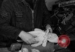 Image of police and firemen mend toys New York United States USA, 1940, second 30 stock footage video 65675056288