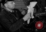 Image of police and firemen mend toys New York United States USA, 1940, second 32 stock footage video 65675056288