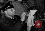 Image of police and firemen mend toys New York United States USA, 1940, second 34 stock footage video 65675056288