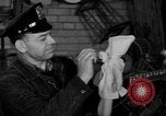 Image of police and firemen mend toys New York United States USA, 1940, second 35 stock footage video 65675056288